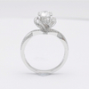 四爪围镶钻石包边钻戒